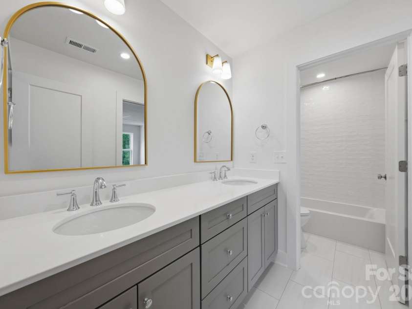 2311 Chateau Court, Matthews, NC 28105.  MLS# CAR4407256, YatesRealty ID 44799. Guest bathroom.