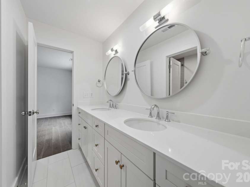 2311 Chateau Court, Matthews, NC 28105.  MLS# CAR4407256, YatesRealty ID 44799. Guest bathroom.