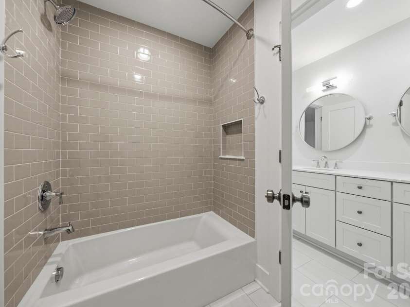 2311 Chateau Court, Matthews, NC 28105.  MLS# CAR4407256, YatesRealty ID 44799. Guest bathroom.