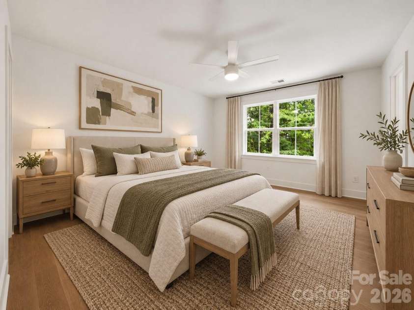 2311 Chateau Court, Matthews, NC 28105.  MLS# CAR4407256, YatesRealty ID 44799. Guest bedroom 1 (image contains AI-generated virtual staging).