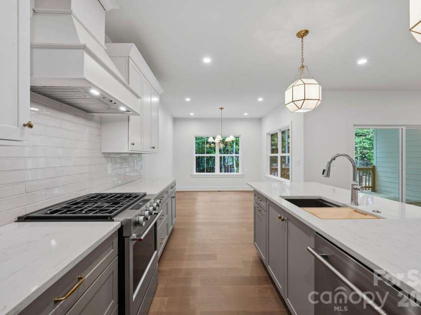 2311 Chateau Court, Matthews, NC 28105.  MLS# CAR4407256, YatesRealty ID 44799. Kitchen.