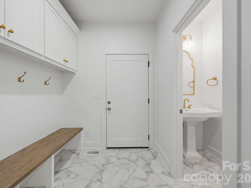 2311 Chateau Court, Matthews, NC 28105.  MLS# CAR4407256, YatesRealty ID 44799. Mudroom.