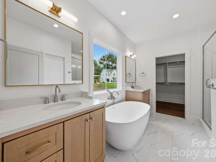 2311 Chateau Court, Matthews, NC 28105.  MLS# CAR4407256, YatesRealty ID 44799. Primary bathroom.
