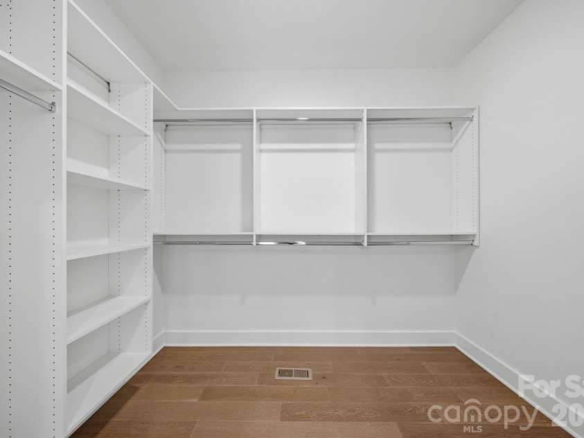2311 Chateau Court, Matthews, NC 28105.  MLS# CAR4407256, YatesRealty ID 44799. Primary closet.