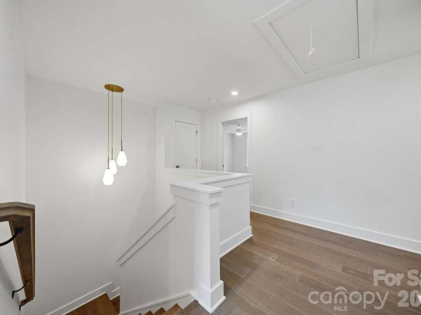 2311 Chateau Court, Matthews, NC 28105.  MLS# CAR4407256, YatesRealty ID 44799. Upper level landing.