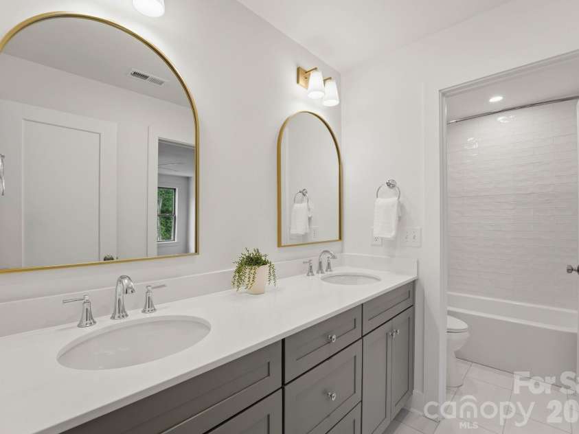 2315 Chateau Court, Matthews, NC 28105.  MLS# CAR4407259, YatesRealty ID 44800. Guest bathroom.