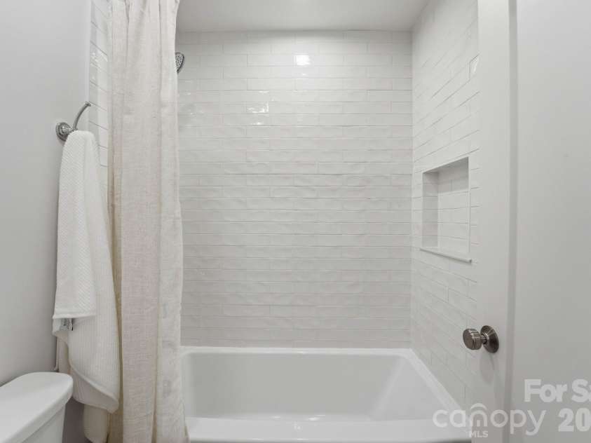 2315 Chateau Court, Matthews, NC 28105.  MLS# CAR4407259, YatesRealty ID 44800. Guest bathroom.
