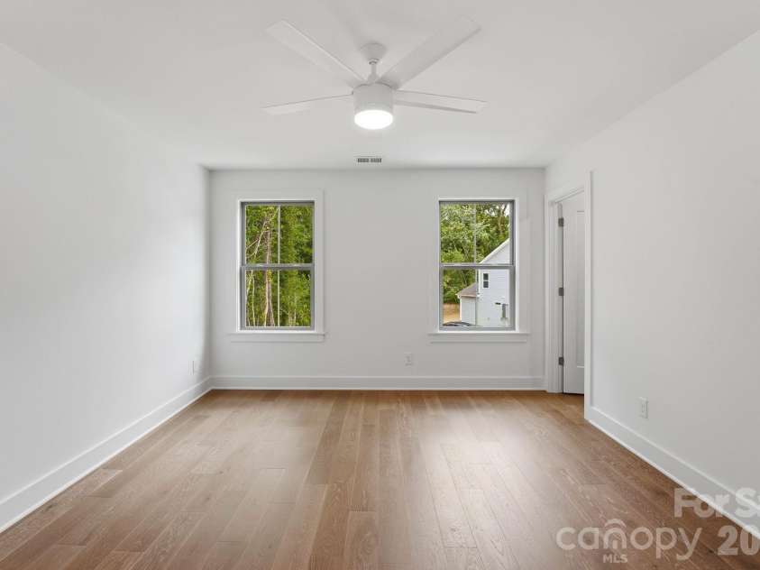 2315 Chateau Court, Matthews, NC 28105.  MLS# CAR4407259, YatesRealty ID 44800. Guest bedroom.