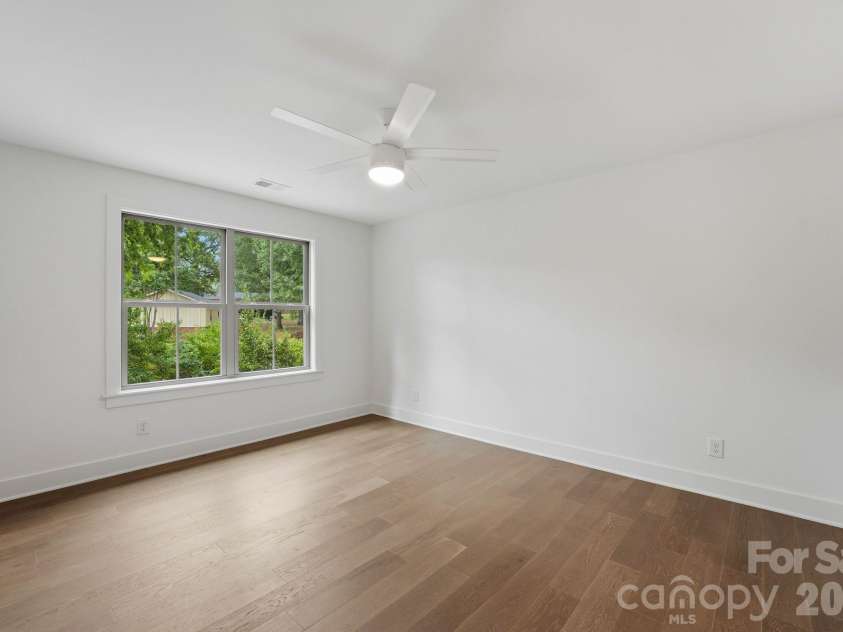 2315 Chateau Court, Matthews, NC 28105.  MLS# CAR4407259, YatesRealty ID 44800. Guest bedroom.