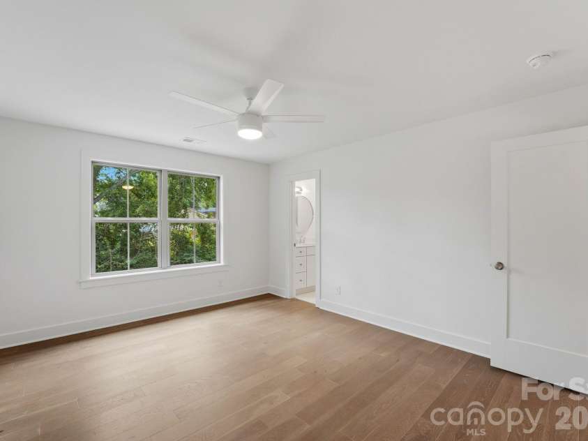 2315 Chateau Court, Matthews, NC 28105.  MLS# CAR4407259, YatesRealty ID 44800. Guest bedroom.