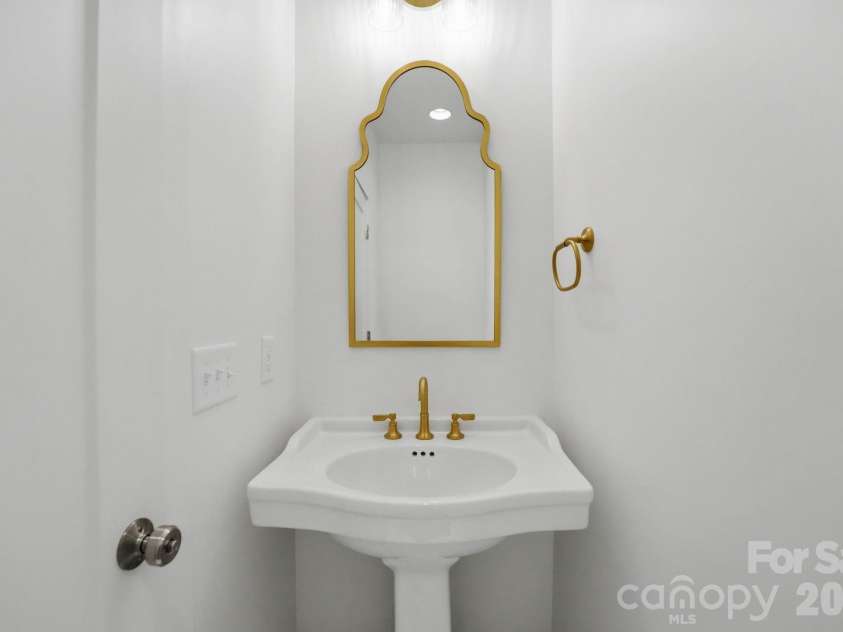 2315 Chateau Court, Matthews, NC 28105.  MLS# CAR4407259, YatesRealty ID 44800. Powder room.