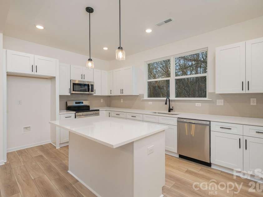 2017 Bishop Madison Lane, Charlotte, NC 28216.  MLS# CAR4415140, YatesRealty ID 44803. 