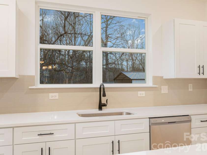 2017 Bishop Madison Lane, Charlotte, NC 28216.  MLS# CAR4415140, YatesRealty ID 44803. 