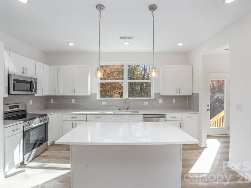2017 Bishop Madison Lane, Charlotte, NC 28216.  MLS# CAR4415140, YatesRealty ID 44803. 
