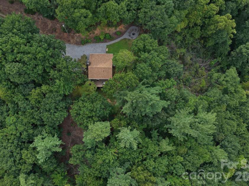 345 Chalk Dust Trail, Purlear, NC 28665.  MLS# CAR4415020, YatesRealty ID 44809. Enjoy Seclusion on 11+ Acres