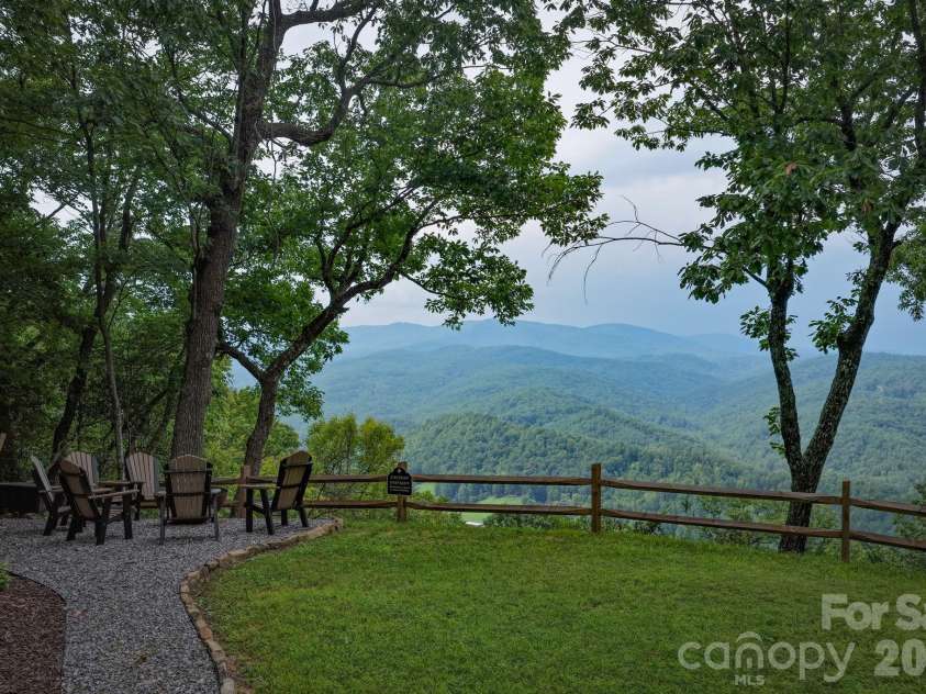 345 Chalk Dust Trail, Purlear, NC 28665.  MLS# CAR4415020, YatesRealty ID 44809. Front Yard with Fire Pit Area