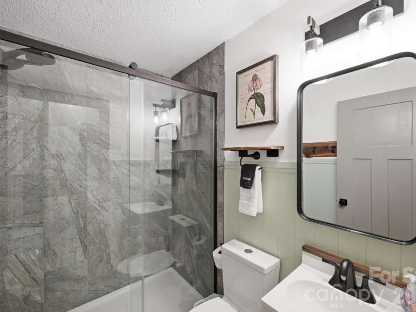 345 Chalk Dust Trail, Purlear, NC 28665.  MLS# CAR4415020, YatesRealty ID 44809. Main Level Bathroom