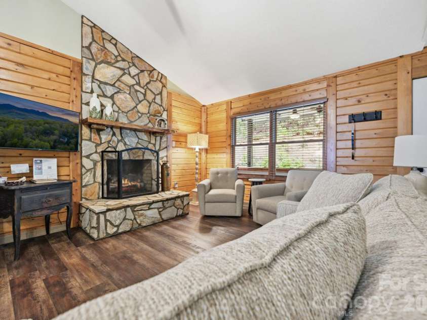 345 Chalk Dust Trail, Purlear, NC 28665.  MLS# CAR4415020, YatesRealty ID 44809. Relax Around the Fireplace