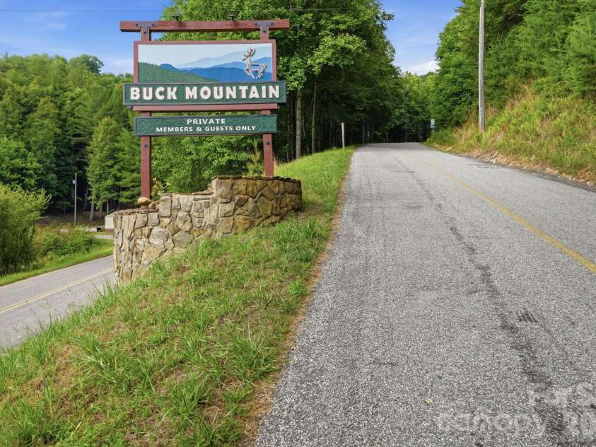 345 Chalk Dust Trail, Purlear, NC 28665.  MLS# CAR4415020, YatesRealty ID 44809. Welcome to Buck Mountain