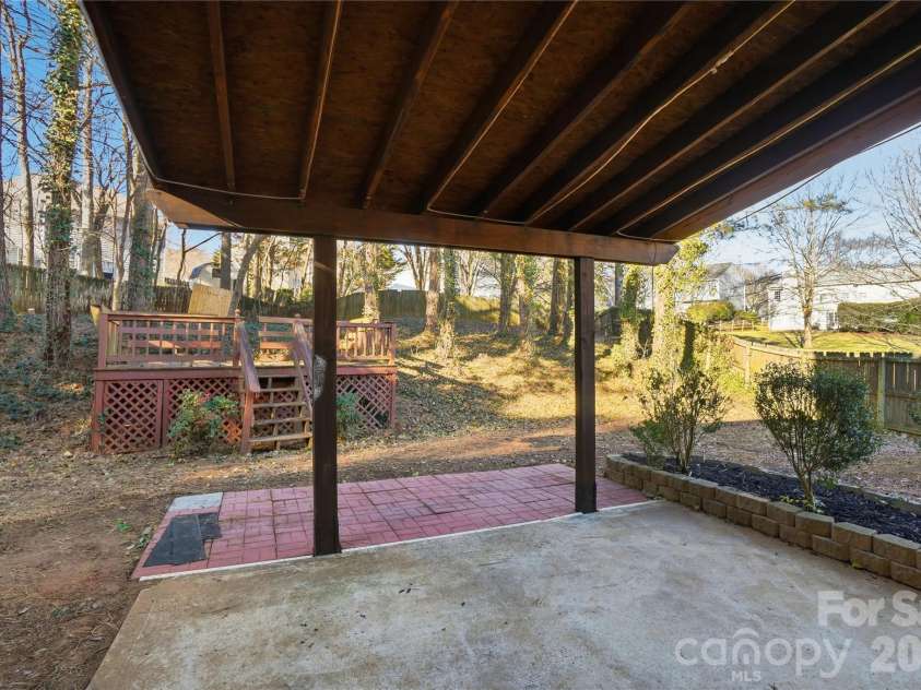 8805 Red Tail Court, Charlotte, NC 28269.  MLS# CAR4336091, YatesRealty ID 4481. Backyard retreat