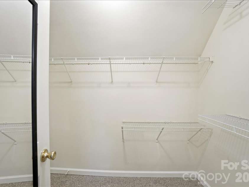 8805 Red Tail Court, Charlotte, NC 28269.  MLS# CAR4336091, YatesRealty ID 4481. Master walk-in closet