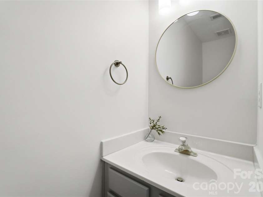 8805 Red Tail Court, Charlotte, NC 28269.  MLS# CAR4336091, YatesRealty ID 4481. Powder room