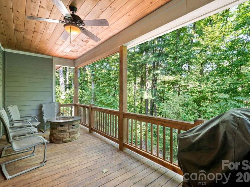 72 Summer Shade Court, Hendersonville, NC 28792.  MLS# CAR4413239, YatesRealty ID 44810. Covered Back Porch with Kitchen and Dining Access