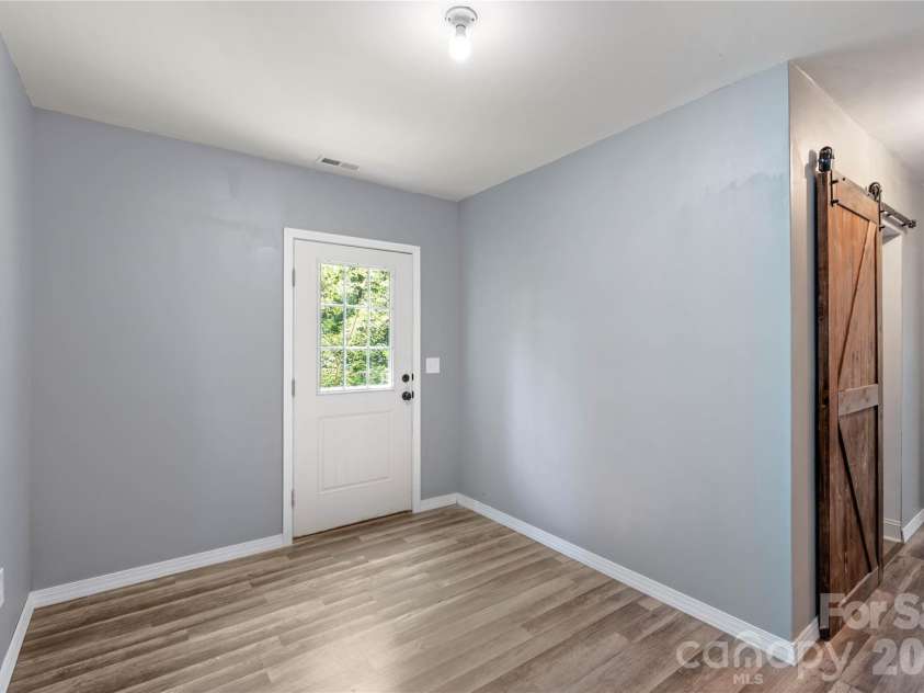 72 Summer Shade Court, Hendersonville, NC 28792.  MLS# CAR4413239, YatesRealty ID 44810. Lower Level Flex Space with Outdoor Access