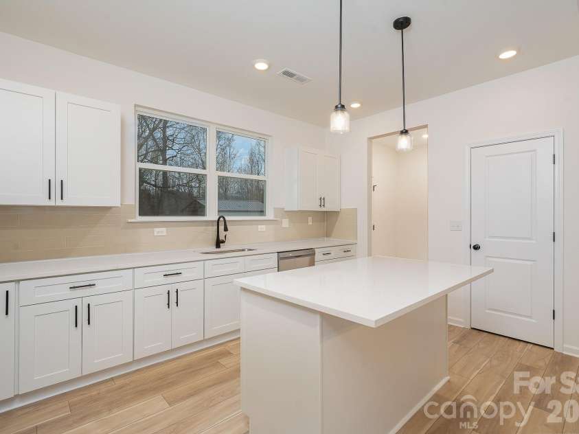 2021 Bishop Madison Lane, Charlotte, NC 28216.  MLS# CAR4415258, YatesRealty ID 44814. 