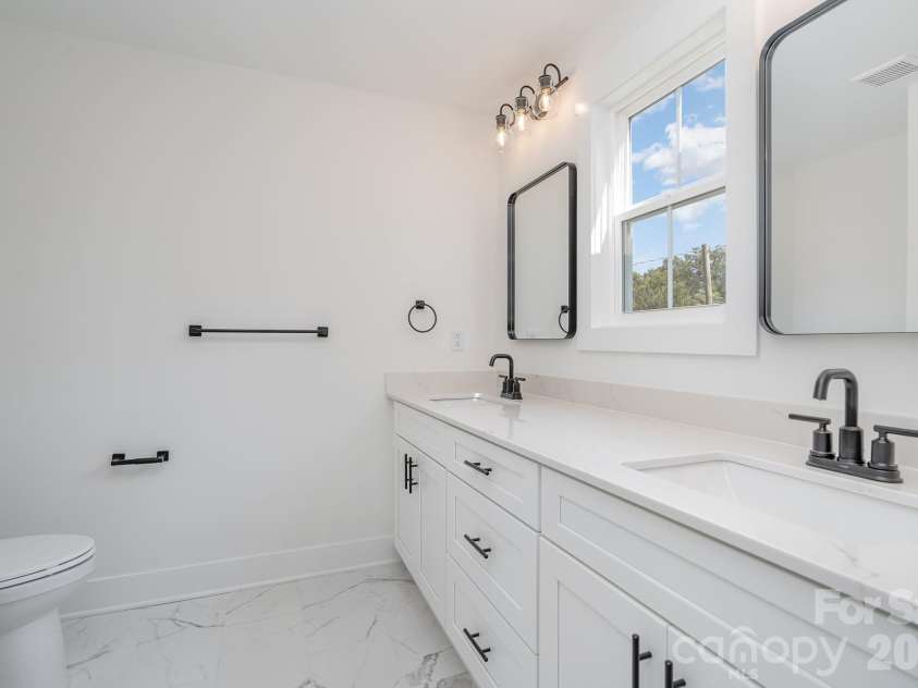2025 Bishop Madison Lane, Charlotte, NC 28216.  MLS# CAR4415261, YatesRealty ID 44816. Representative photo