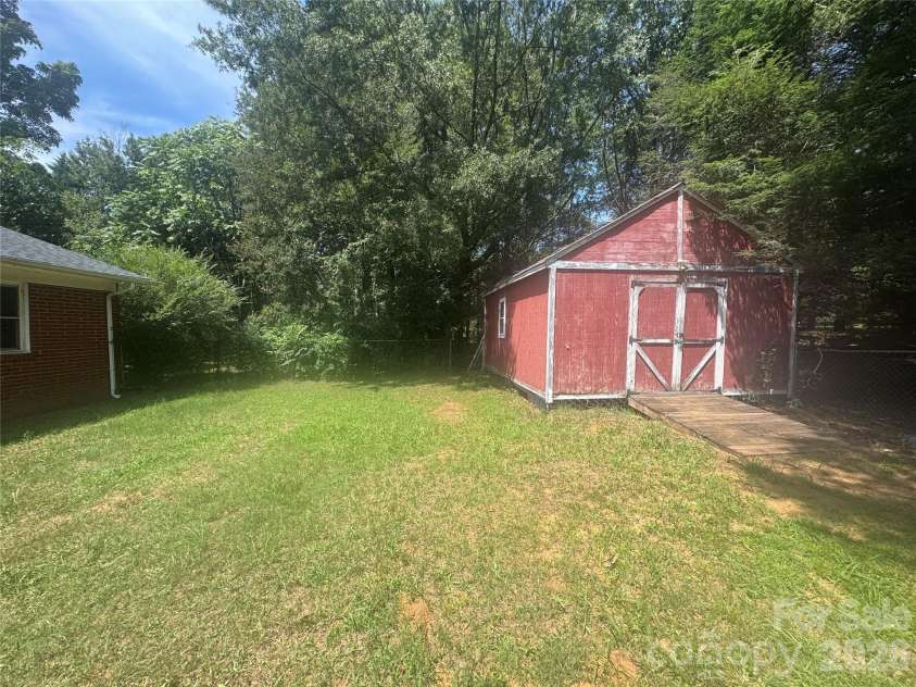 2175 Triplett Road, Mt Ulla, NC 28125.  MLS# CAR4415272, YatesRealty ID 44818. Shed conveys