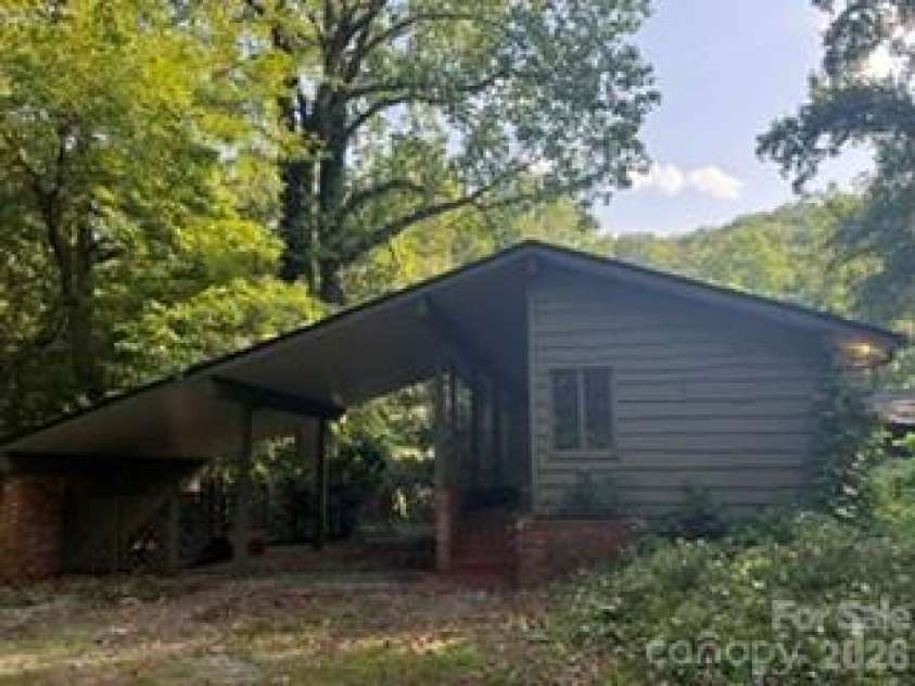 103 Brookwood Drive, Tryon, NC 28782.  MLS# CAR4415277, YatesRealty ID 44819. 