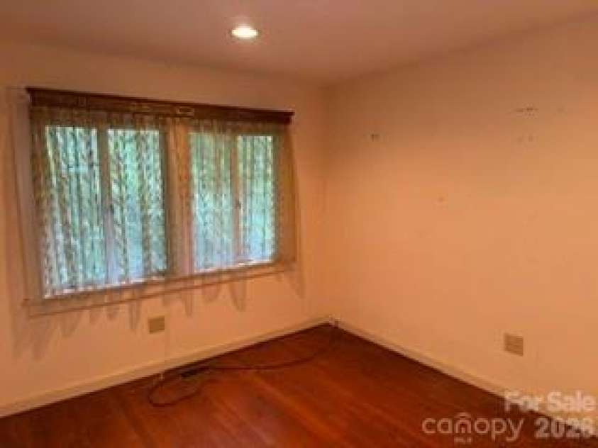 103 Brookwood Drive, Tryon, NC 28782.  MLS# CAR4415277, YatesRealty ID 44819. 