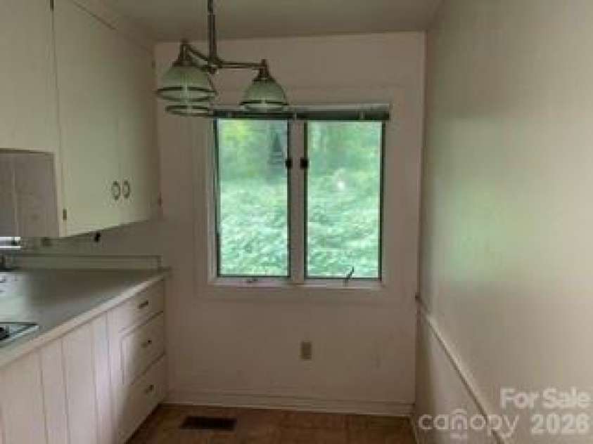 103 Brookwood Drive, Tryon, NC 28782.  MLS# CAR4415277, YatesRealty ID 44819. 