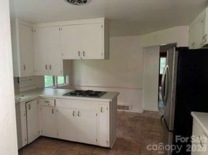 103 Brookwood Drive, Tryon, NC 28782.  MLS# CAR4415277, YatesRealty ID 44819. 