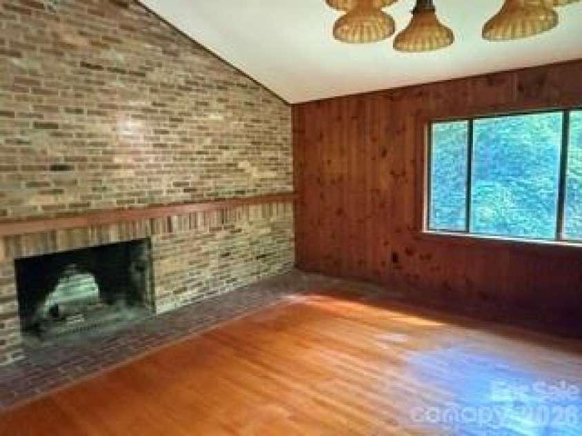 103 Brookwood Drive, Tryon, NC 28782.  MLS# CAR4415277, YatesRealty ID 44819. 