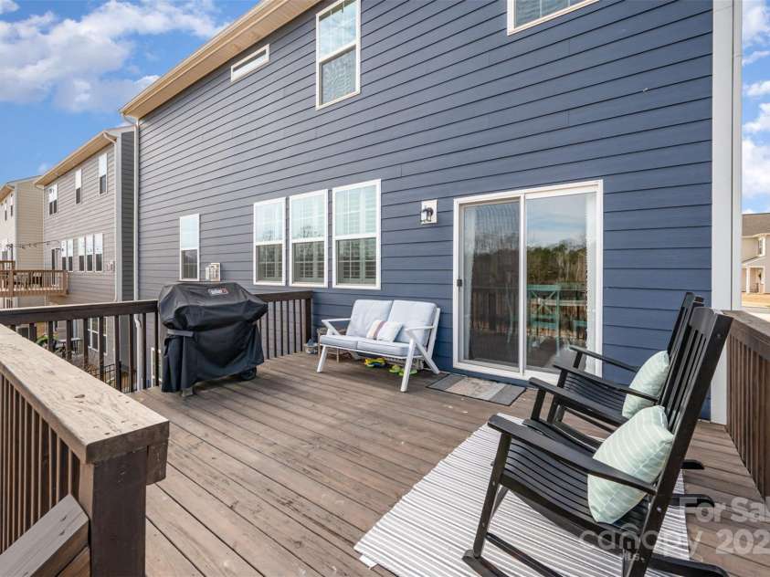 1051 Lookout Shoals Drive, Fort Mill, SC 29715.  MLS# CAR4222088, YatesRealty ID 4482. Large deck off kitchen area