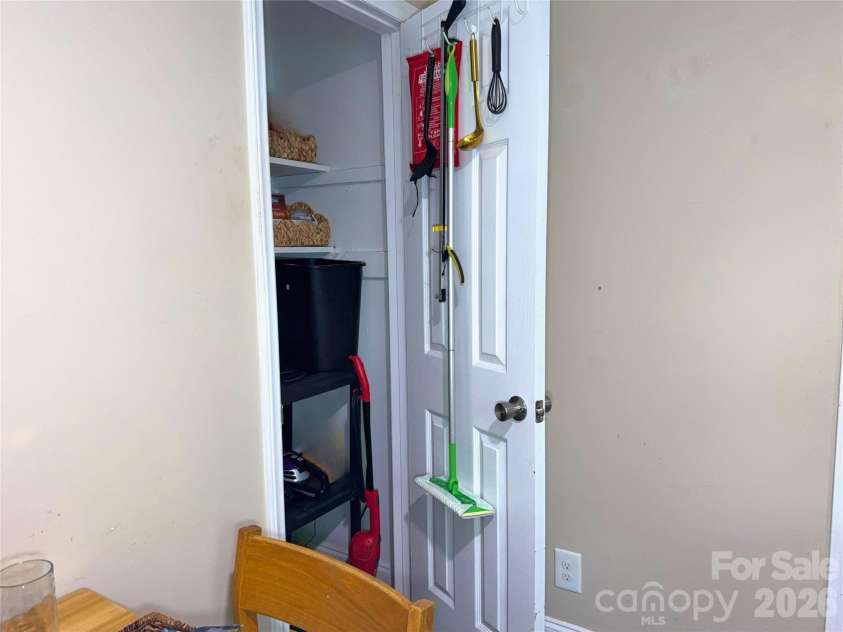 1801 Purser Drive, Charlotte, NC 28215.  MLS# CAR4414235, YatesRealty ID 44823. Kitchen. Spacious pantry.