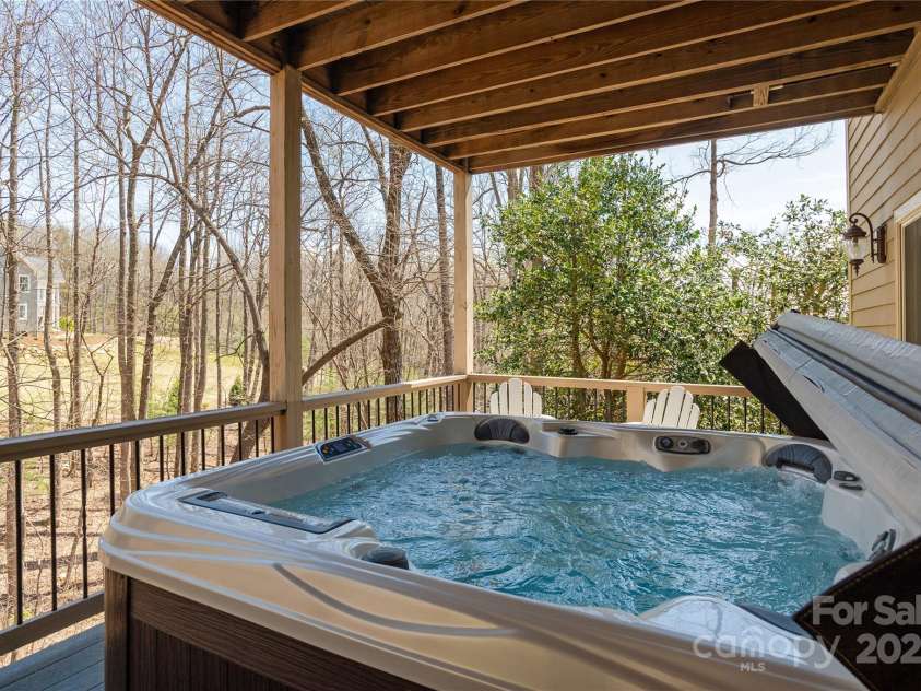 23 Dartmoor Court, Flat Rock, NC 28731.  MLS# CAR4241308, YatesRealty ID 4483. Hot Tub on Lower Deck