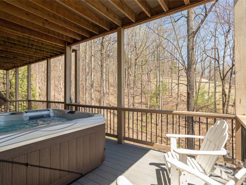 23 Dartmoor Court, Flat Rock, NC 28731.  MLS# CAR4241308, YatesRealty ID 4483. Hot Tub on Lower Deck