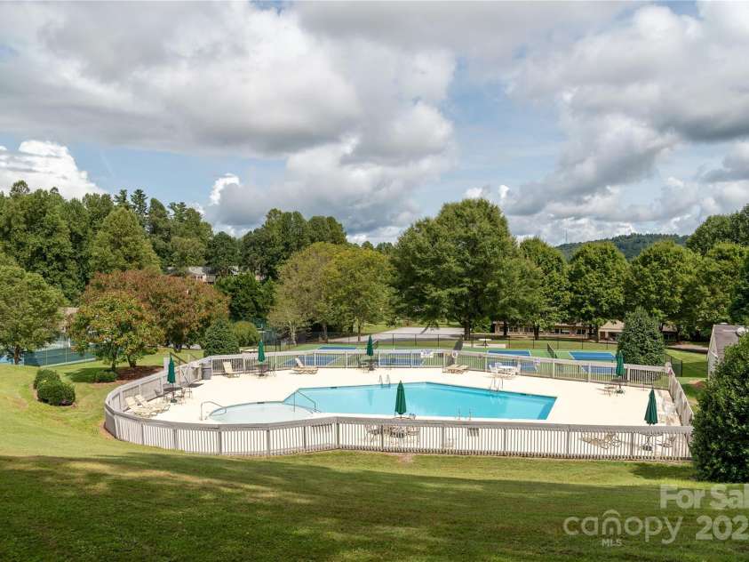 23 Dartmoor Court, Flat Rock, NC 28731.  MLS# CAR4241308, YatesRealty ID 4483. Kenmure Outdoor Pool