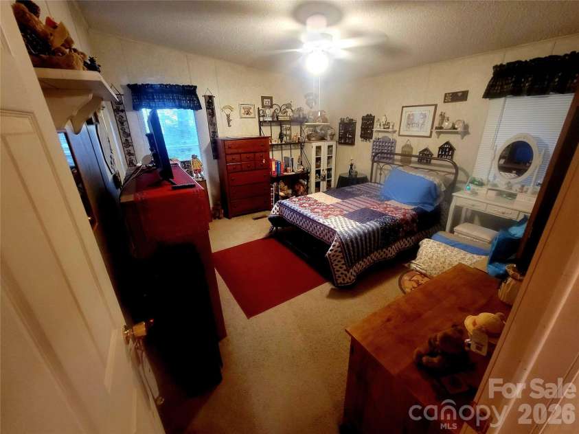 121 Sylvan Drive, Statesville, NC 28677.  MLS# CAR4414812, YatesRealty ID 44831. Second bedroom