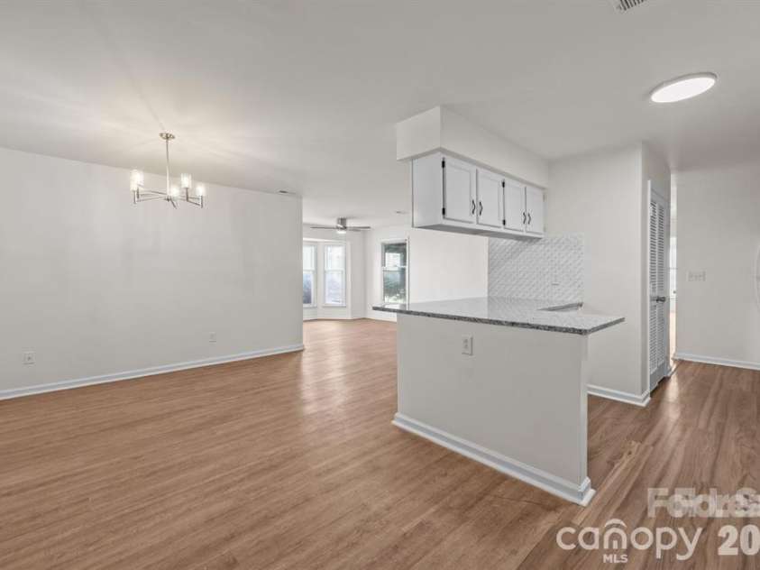 6203 Rosecroft Drive, Charlotte, NC 28215.  MLS# CAR4409527, YatesRealty ID 44835. Open concept kitchen and living
