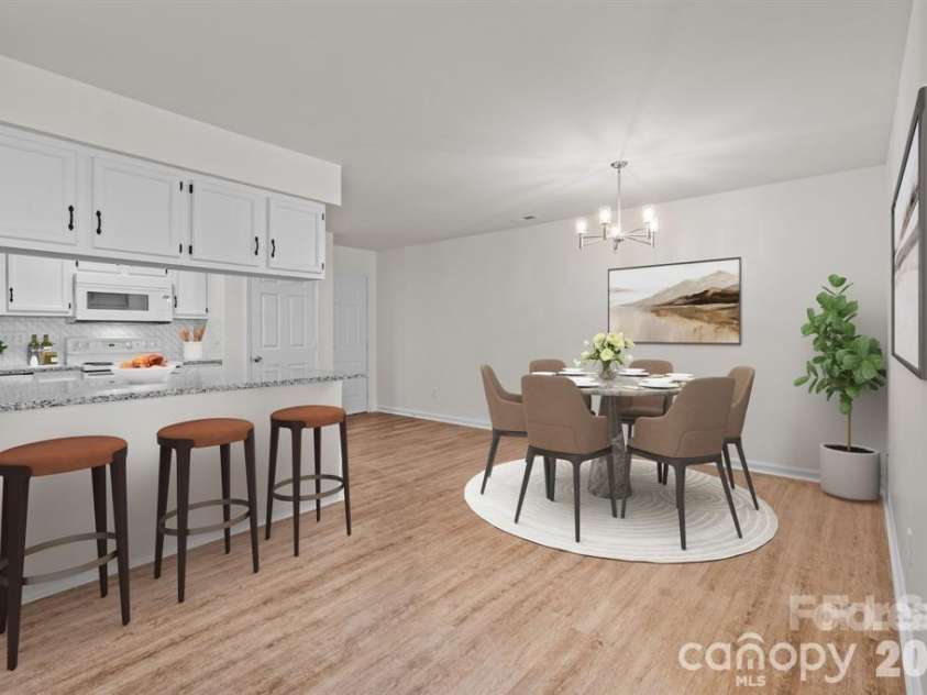 6203 Rosecroft Drive, Charlotte, NC 28215.  MLS# CAR4409527, YatesRealty ID 44835. Virtually staged open concept dining area