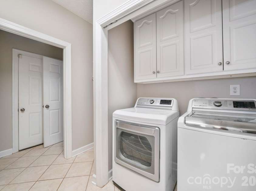 11 Greenway Drive, Granite Falls, NC 28630.  MLS# CAR4410404, YatesRealty ID 44839. Laundry room off the garage