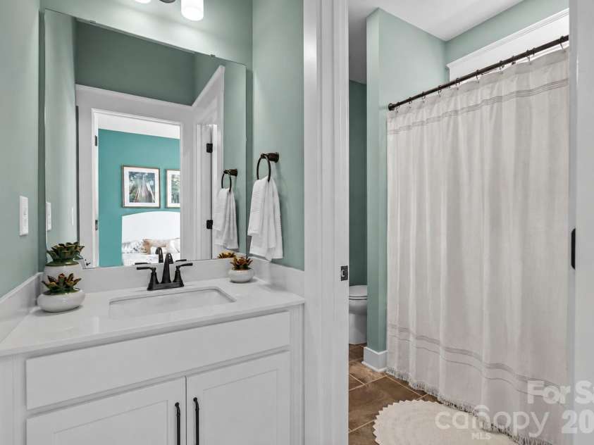 3031 Grandiose Drive, Indian Trail, NC 28079.  MLS# CAR4411902, YatesRealty ID 44844. Dedicated Vanity for Bedroom #2 at Shared Bath #2 - Model Home, For Reference Only.
