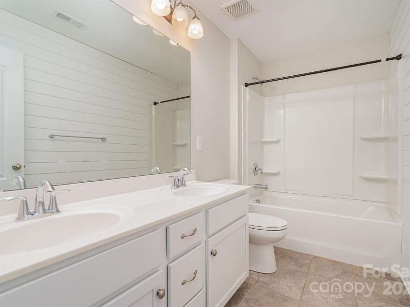 1878 Sapphire Meadow Drive, Fort Mill, SC 29715.  MLS# CAR4209802, YatesRealty ID 4485. 2nd floor hall bathroom