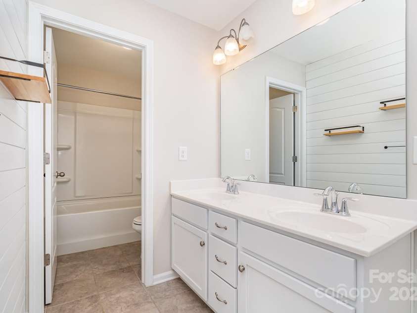 1878 Sapphire Meadow Drive, Fort Mill, SC 29715.  MLS# CAR4209802, YatesRealty ID 4485. 2nd floor jack and jill bathroom