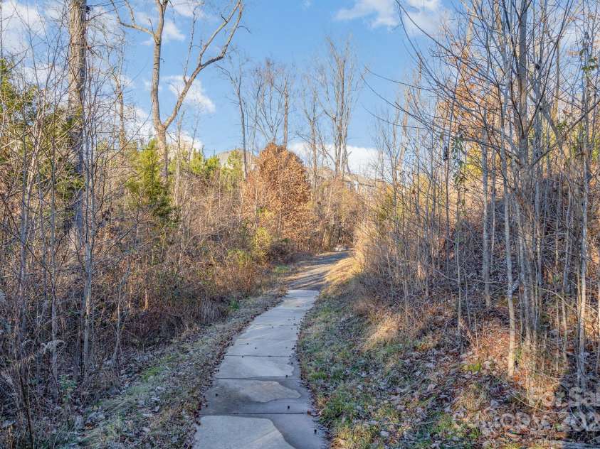 1878 Sapphire Meadow Drive, Fort Mill, SC 29715.  MLS# CAR4209802, YatesRealty ID 4485. Community walking trails