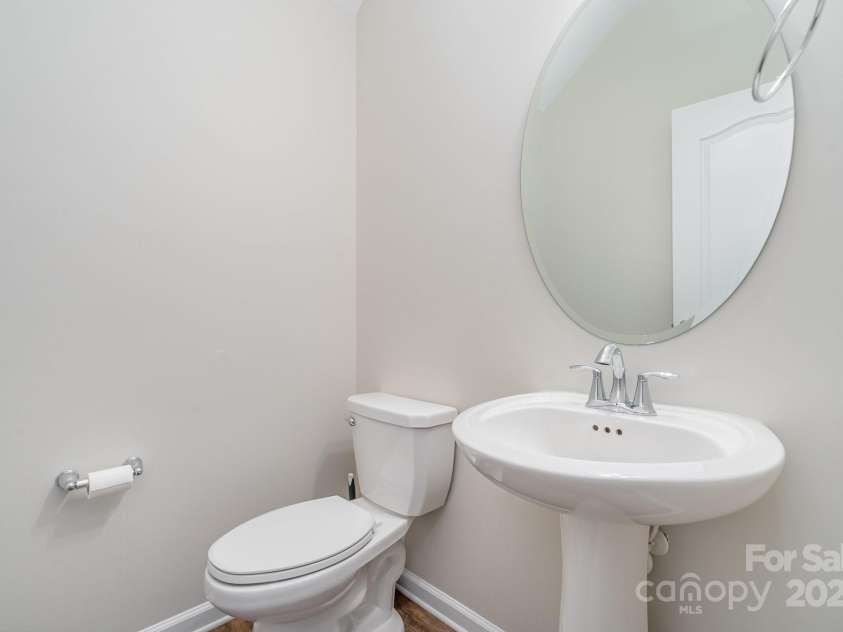 1878 Sapphire Meadow Drive, Fort Mill, SC 29715.  MLS# CAR4209802, YatesRealty ID 4485. First floor powder room